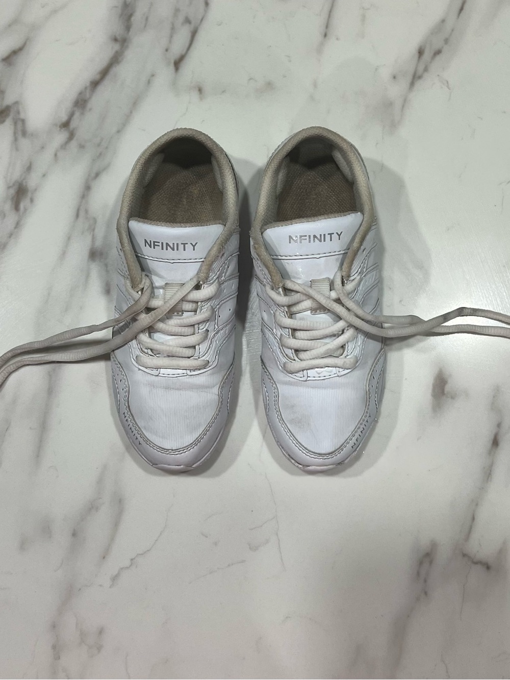NFINITY White Low-Top Sneakers